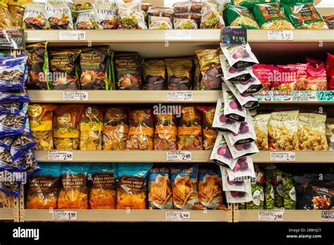 Shelves Of Snack Chips Or Snack Crisps Inside A Trader Joes Market