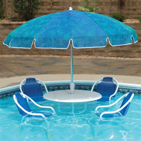 Outdoor swimming pool chair white color. Swimming Pool Patio Table Set - The Green Head