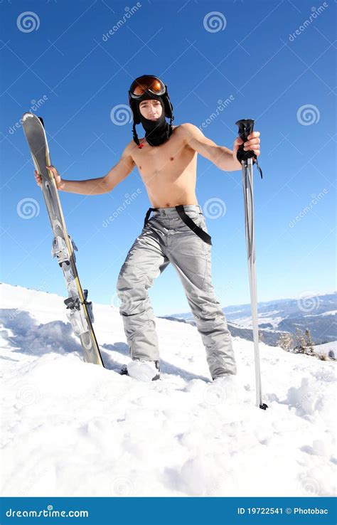 Male Skier Holding Skis And Ski Poles Stock Image Image 19722541