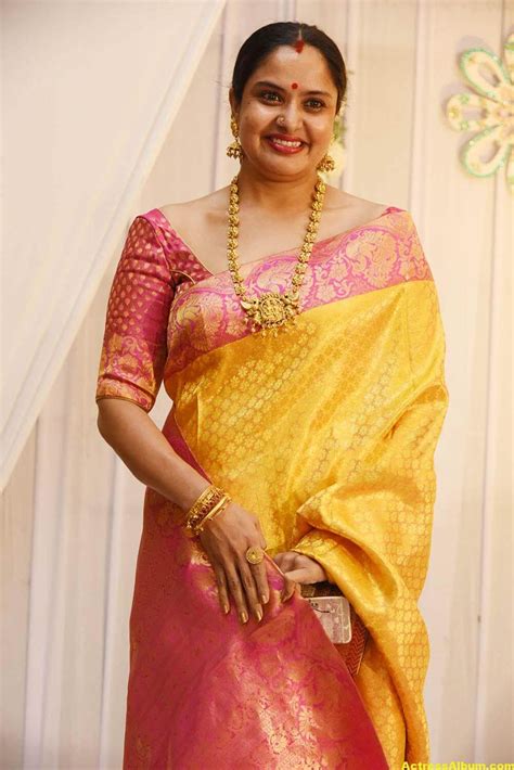 Movie Actress Pragathi Hot Photos In Yellow Saree