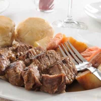 Place roast in slow cooker and layer onions, bay leaves, bouillon cubes, crushed garlic and cream of mushroom soup. Main Ingredients | Paula Deen's Pot Roast Recipe ...