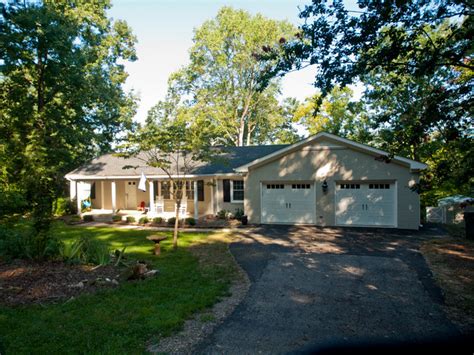 Curb appeal is enhanced by the choice of materials that includes classic grey siding with cultured stone. Master Bedroom, Bath, Garage Addition on 1962 Ranch ...