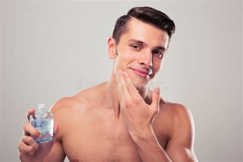 Man Applying Lotion After Shave On Face Stock Image Image Of Fresh