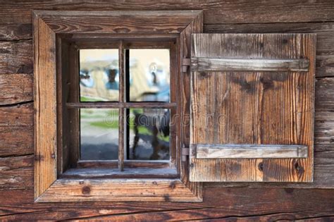 Window With Open Wooden Shutter In An Old Rural Building Stock Photo