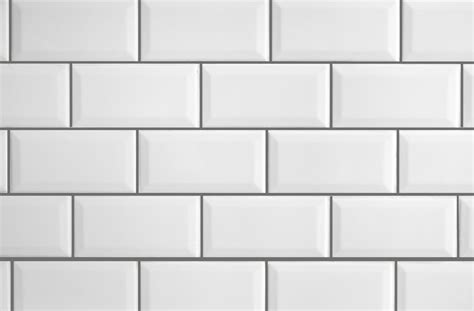 The beveled white subway tile enlarges the space to make the galley kitchen seem larger. Light Gray Grout Pen - moneyduitfree
