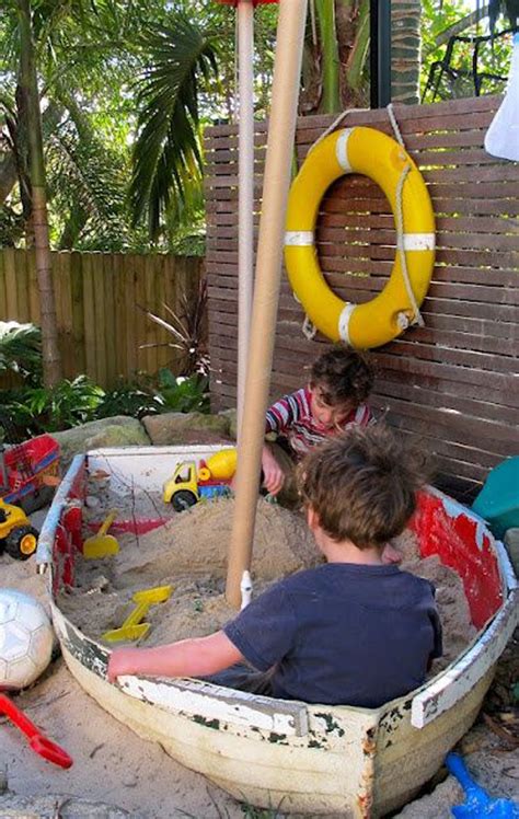 There are a lot of activities to enjoy around us. outdoor-kids-play-with-upcycle-boats | HomeMydesign
