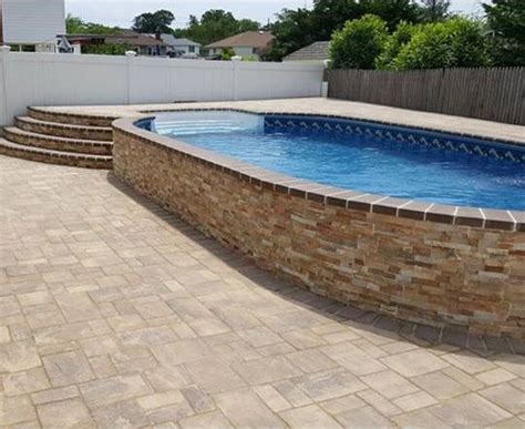 Radiant 12x24 Semi Inground Oval With Walk In Steps And Pavers In