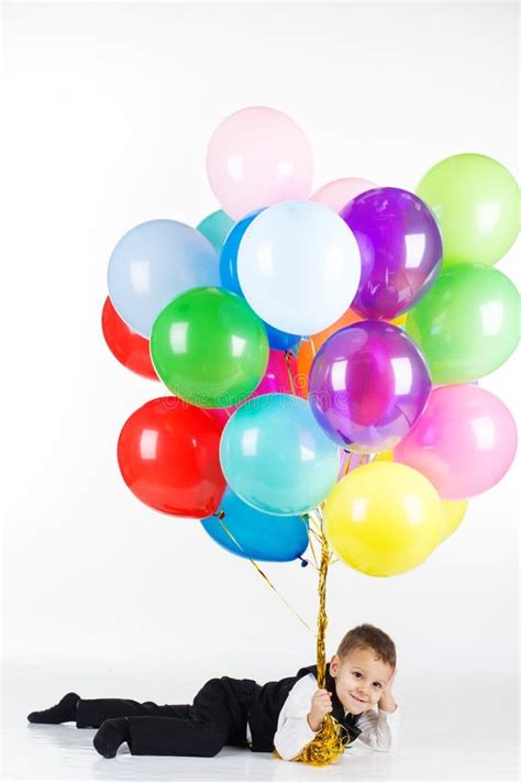 Little Boy Holding Colorful Balloons Stock Image Image Of Baby