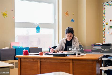 Teacher In A Classroom Without Students At Schools Out High Res Stock