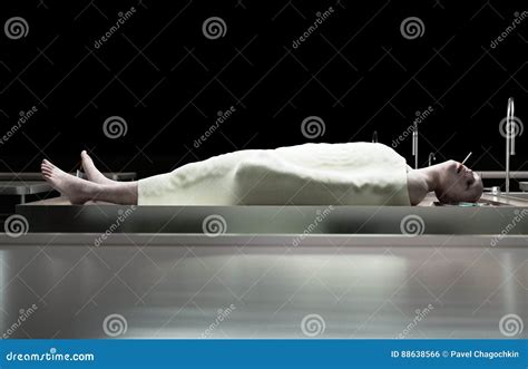 smoking kills dead male body in morgue on steel table corpse autopsy concept 3d rendering