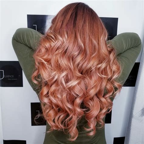 Therefore, giving the hair a quick blast of cold water or placing a shower cap over your hair after it's been washed are two much easier (and less chilly) ways to protect colored hair. Strawberry copper color on long wavy hair