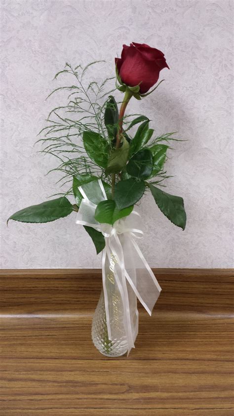 single red rose in a bud vase with greens in 2020 with images single rose bouquet red rose