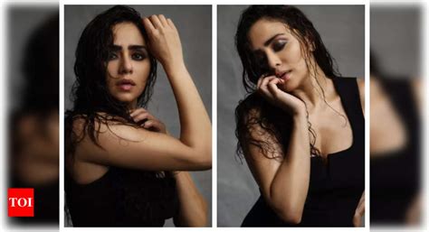 amruta khanvilkar raises the temperature with her stunning clicks in this black dress see pics