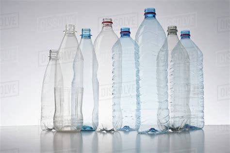 Row Of Plastic Bottles Stock Photo Dissolve