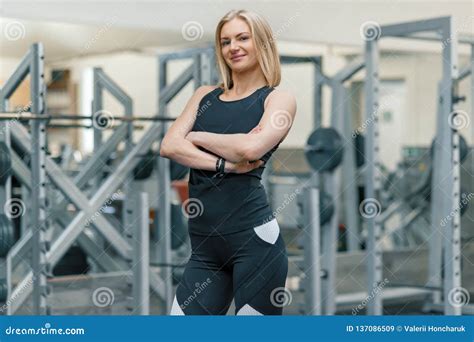 Woman Personal Trainer Wearing Black Sportswear Royalty Free Stock
