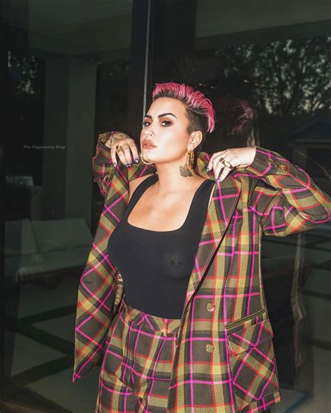 demi lovato shows off her pierced nipple 4 photos thefappening