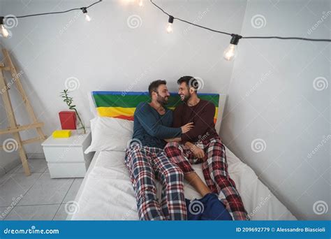 Happy Gay Couple Having Tender Moments In Bedroom Homosexual Love