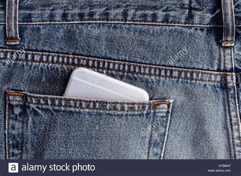 Smartphone In The Back Pocket Of Blue Jeans Stock Photo Alamy