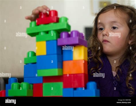 Young Girl Playing With Building Blocks Hi Res Stock Photography And