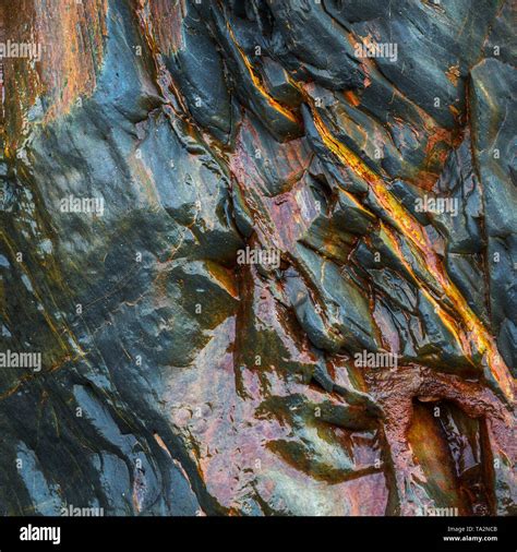 Wet Blue Slate Rock Texture With Reddish Rust Grit Stock Photo Alamy