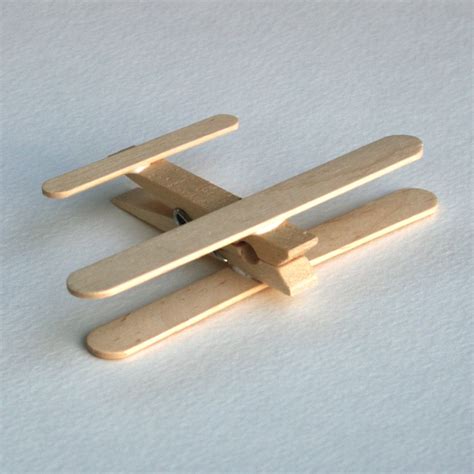 Planes Made From Clothes Pins And Popsicle Sticks Craft Stick Crafts