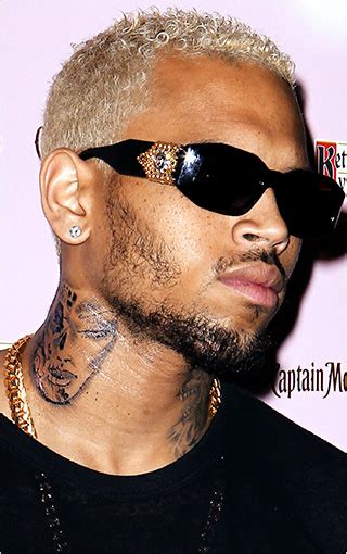 This tattoo represents, dios de los muertos which means the day of the dead which is a mexican festival to. Bossmaurice's Blog:::: Photos - Chris Brown Shows off New Neck Tattoo of a Beaten Woman, denies ...