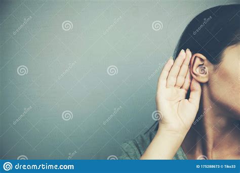 Woman Holds Her Hand Near Ear And Listens Carefully Stock Image Image