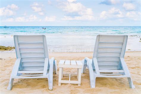 Beautiful Beach Chairs On Tropical White Sand Beach Stock Image