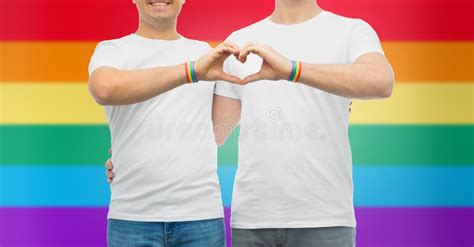 Couple With Gay Pride Rainbow Wristbands And Heart Stock Image Image
