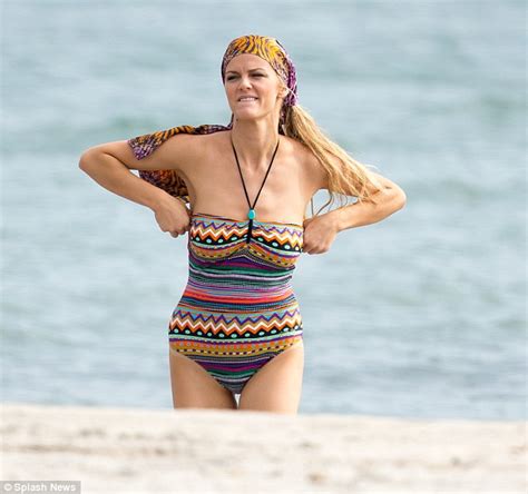 Brooklyn Decker Corrects Her Errant Curves After Her Bikini Slips Down