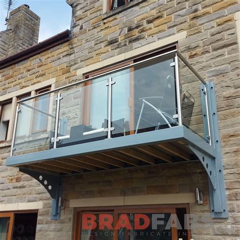 Bespoke Cantilevered Balcony With Stainless Steel And Glass Balustrade