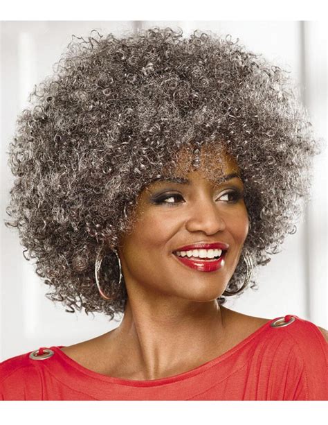 Because black hair doesn't hold extensions easily like caucasian hair does. Big afro old women's capless grey hairstyle