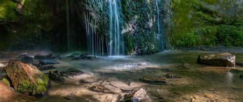 Download Wallpaper 2560x1080 Waterfall Cliff Stones River Water