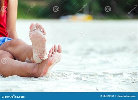 A Woman Tanned Legs On Sand Beach Travel Concept Stock Image Image