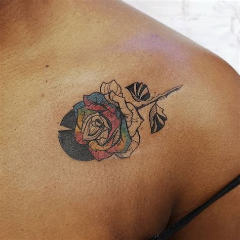 Getting a new shoulder tattoo can be a great excuse to show off your hard work, not that you should need one… another dragon tattoo and example of reds and black inks working well together. If you're considering getting a small rose tattoo on your ...