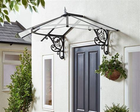 Front door awnings protect and individualize the first thing you or your customers see when you enter a building. Palram Lily™ Door Awning 48x70 Black Frame Clear Panels ...