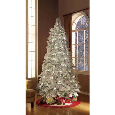 There is also a selection of glitter and flashing lights to peruse in an array of colours. Holiday Time 7.5ft Pre-Lit Flocked Artificial Christmas ...
