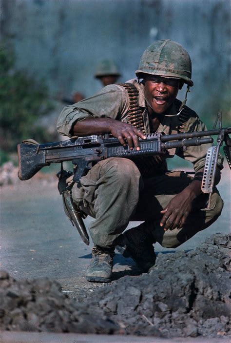 Vietnam Marines Advance Down An Open Street During The Battle Of Hue
