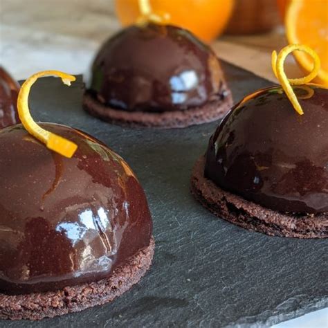 These orange chocolate mousse domes are one of the most elegant dessert you can prepare for upcoming holidays. Chocolate and Orange Mousse Domes | Cooking Fantasies