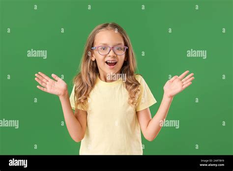 Surprised Little Girl On Color Background Stock Photo Alamy