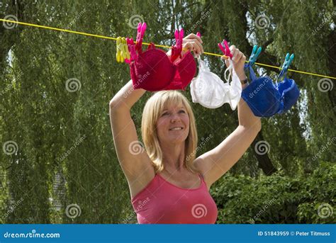 Woman Hanging Out Her Washing Stock Image Image Of Aged Undergarment 51843959
