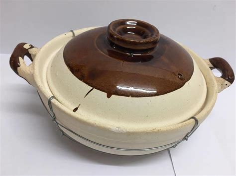 Because clay cookware retains heat much better than metal cookware. Clay Pot Double Handle 22cm from Buy Asian Food 4U