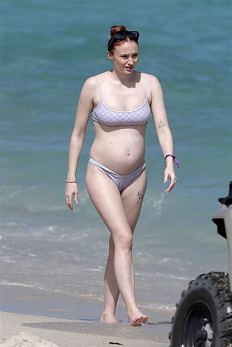 Sophie Turner Shows Off Her Belly In A Lavender Bikini On The Beach In Miami Florida