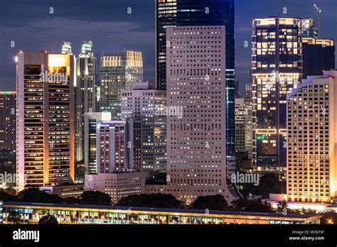 Night View Of Jakarta Downtown District In Indonesia Capital City And