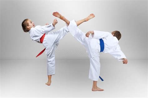 Girl And Boy Are Hitting A High Kick Leg Stock Image Image Of