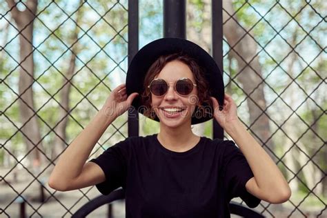 the girl smiles in a hat and sunglasses stock image image of lady adult 212169147