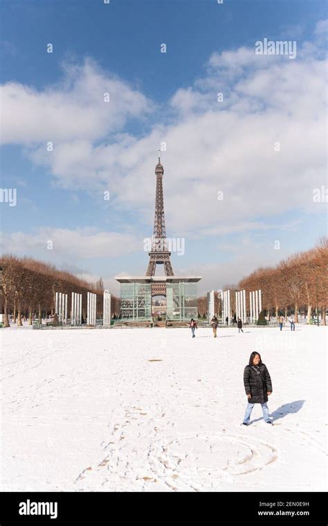 Eiffel Tower Snow Taking Picture Hi Res Stock Photography And Images