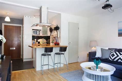 Las cocinas abiertas al salón se convierten, sin lugar a dudas, en el corazón de la casa. 37 Square Meter Flat Boosting An Open Space Area