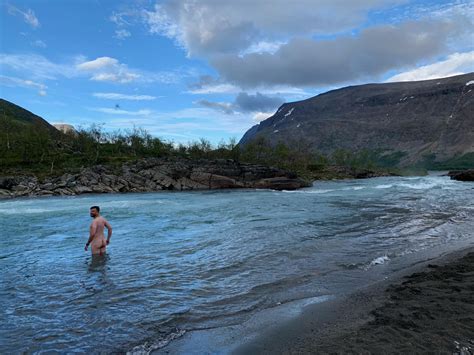 skinny dipping in a cold river above the arctic circle in kaitumjaure sweden r skinnydipping