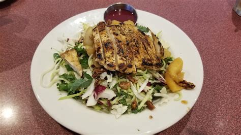 A large basket of warm, freshly cooked wedges of seasoned olga bread, served with swiss almond cheese. Olga's Kitchen seasonal menu items: Autumn Turkey and ...